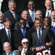 Barack Obama poses with members of the Chicago Bears, including quarterback Jim McMahon (front row, center), during an event celebrating the 1985 Super Bowl champs Oct. 7, 2011, on the South Lawn of the White House. Several members of the 1985 Bears have been named in a lawsuit against the NFL.
MANDEL NGAN/AFP/Getty Images